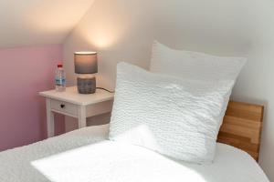 Postel nebo postele na pokoji v ubytování Le Cissereau - Chambres et table d'hôtes