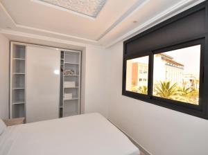 Postel nebo postele na pokoji v ubytování Appartement Riyam
