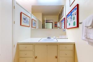 a bathroom with a sink and a mirror at Treetop Chalet in Peru +43 photos