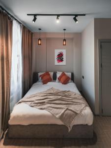 Postel nebo postele na pokoji v ubytování Dastan Hotel Baku