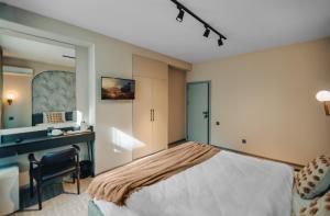 Postel nebo postele na pokoji v ubytování Dastan Hotel Baku