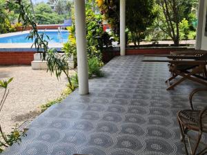 A garden outside Magnolia Guesthouse Varkala