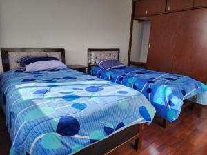 Postel nebo postele na pokoji v ubytování Departamento en el Centro - Puno