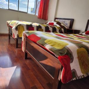 Postel nebo postele na pokoji v ubytování Departamento en el Centro - Puno