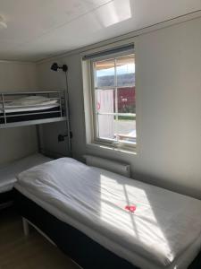 Letto o letti in una camera di Rum mitt stan