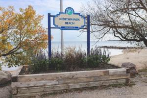 a sign for a northumsack beach on the beach at Chateau Ridge in Blue Mountains