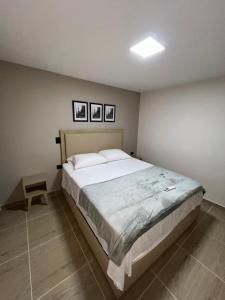 Postel nebo postele na pokoji v ubytování Laureles Inn
