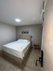 Postel nebo postele na pokoji v ubytování Laureles Inn