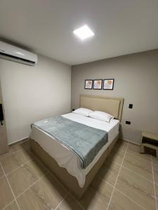 Postel nebo postele na pokoji v ubytování Laureles Inn