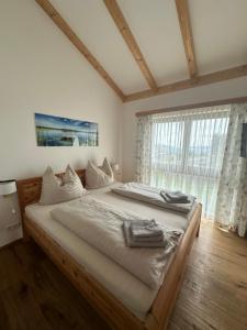 Postel nebo postele na pokoji v ubytování Appartement Weitblick