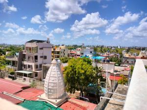 a view of a city from the roof of a building at SRUSHTI The Peace Home HOME STAY in Kolhapur +17 photos