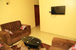 TV a/nebo společenská místnost v ubytování Palm Star Motel