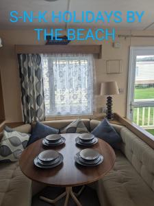 Χώρος καθιστικού στο Golden anchor chapel st leonards 3 bed caravan