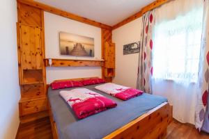 Postel nebo postele na pokoji v ubytování Ferienhaus Mooshöf