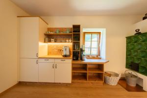 Kuchyň nebo kuchyňský kout v ubytování Ferienhaus Mooshöf
