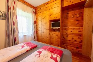 Postel nebo postele na pokoji v ubytování Ferienhaus Mooshöf