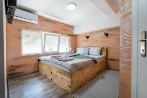 Postel nebo postele na pokoji v ubytování Aleks apartmani