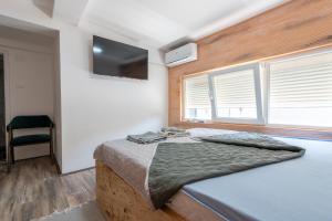Postel nebo postele na pokoji v ubytování Aleks apartmani