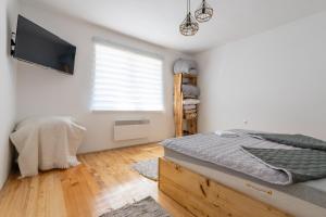 Postel nebo postele na pokoji v ubytování Aleks apartmani