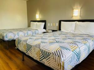 Postel nebo postele na pokoji v ubytování Motel 6-Duncanville, TX - Dallas
