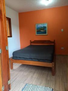 Postel nebo postele na pokoji v ubytování Sítio Casa Grande