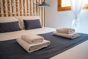 Posteľ alebo postele v izbe v ubytovaní La casita de Real de Cartuja - Apartamento Deluxe opción parking
