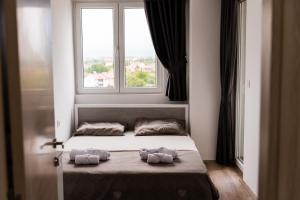 Postel nebo postele na pokoji v ubytování Apartment Sofija