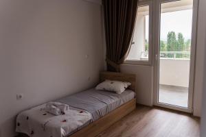 Postel nebo postele na pokoji v ubytování Apartment Sofija
