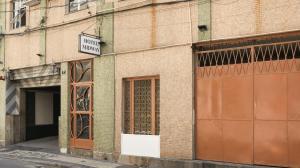 a brick building with a sign that reads home mummy at Midway Hotel in Rio de Janeiro +50 photos