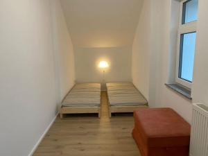 Postel nebo postele na pokoji v ubytování Attractive apartment in Olbersdorf
