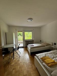 Postel nebo postele na pokoji v ubytování A&D Monteurzimmer Ferienwohnung