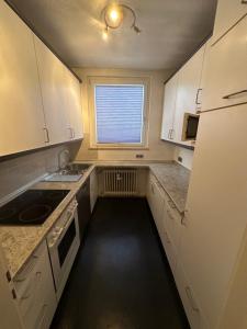 Kuchyň nebo kuchyňský kout v ubytování A&D Monteurzimmer Ferienwohnung + 7 fotografií