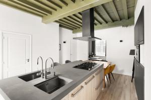 Kuchyň nebo kuchyňský kout v ubytování Appartement Langeviele 71