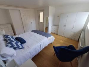 Voodi või voodid majutusasutuse Home in Dungarvan toas