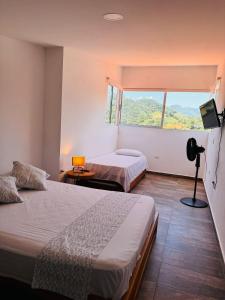 Postel nebo postele na pokoji v ubytování Lagom Apartamentos San Rafael