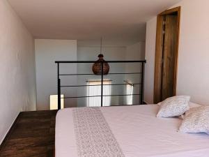 Postel nebo postele na pokoji v ubytování Lagom Apartamentos San Rafael