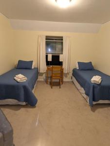 Ένα ή περισσότερα κρεβάτια σε δωμάτιο στο Twin room near Hillsboro
