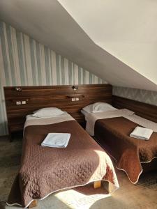 Postel nebo postele na pokoji v ubytování Gościniec Jurajski + 3 fotografie