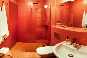 a bathroom with a shower and a toilet and a sink at Pannonia View Delight in Budapest +46 photos