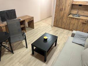 a living room with a couch and a coffee table at NIKA The architect DIAMOND OF GEVGELIA in Gevgelija