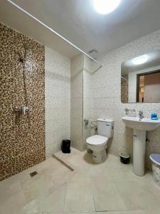 Ένα μπάνιο στο Appartement Haut Standing en Plein Coeur de la Ville