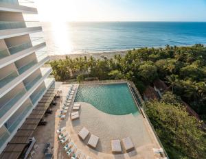 an aerial view of a hotel and the beach at Hilton Santa Marta in Santa Marta