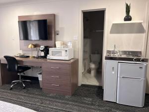 Kuchyň nebo kuchyňský kout v ubytování SureStay by Best Western Kapuskasing