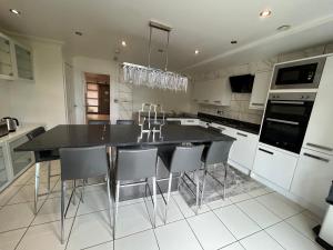 Η κουζίνα ή μικρή κουζίνα στο Beautiful house in Slough