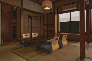 a dining room with a table and chairs at CraftFlat Asakusa House in Tokyo