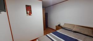 Postel nebo postele na pokoji v ubytování Hotel Cordillera Cabildo