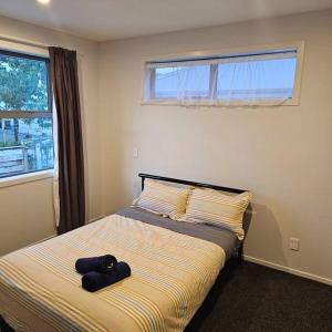 Ένα ή περισσότερα κρεβάτια σε δωμάτιο στο Entire house - Brand New 2 Bedroom house