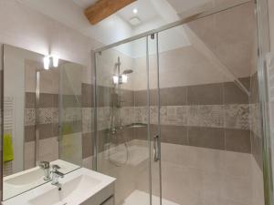 a bathroom with a glass shower and a sink at Gîte spacieux à Happonvilliers avec jardin privatif, accueil jusqu'à 14 personnes, animaux admis - FR-1-581-139 in Happonvilliers