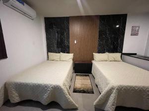 Postel nebo postele na pokoji v ubytování Apartamentos AEROPUERTO