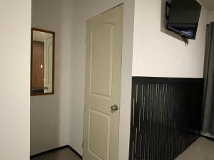 TV a/nebo společenská místnost v ubytování Apartamentos AEROPUERTO